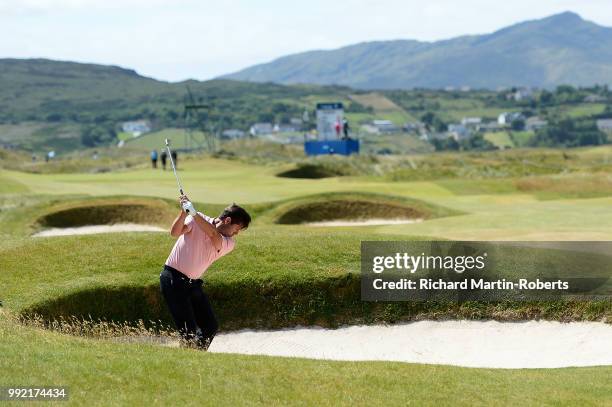 Robert Rock of England plays his second shot on the 16th hole during day one of the Dubai Duty Free Irish Open at Ballyliffin Golf Club on July 5,...