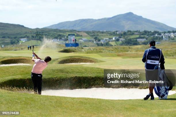 Robert Rock of England plays his second shot on the 16th hole during day one of the Dubai Duty Free Irish Open at Ballyliffin Golf Club on July 5,...