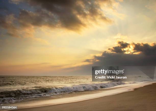 beach view as the sun sets in november at robert moses - robert moses stock pictures, royalty-free photos & images