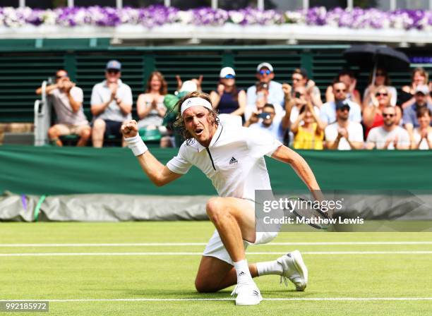 Stefanos Tsitsipas of Greece celebrates after defeating Jared Donaldson of the United States in their Men's Doubles first round match on day four of...