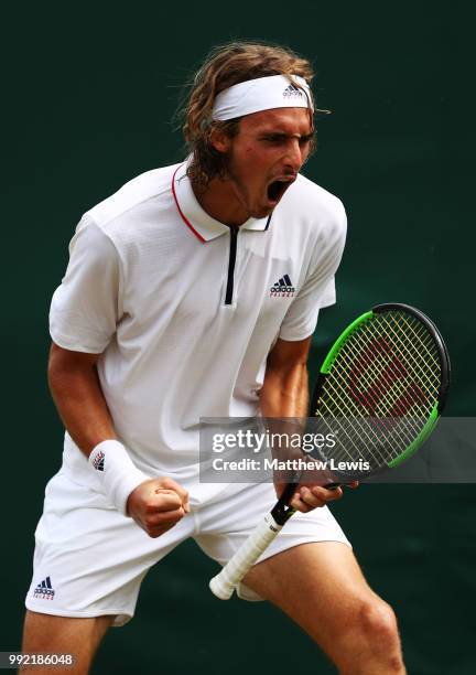 Stefanos Tsitsipas of Greece celebrates a point against Jared Donaldson of the United States during their Men's Doubles first round match on day four...