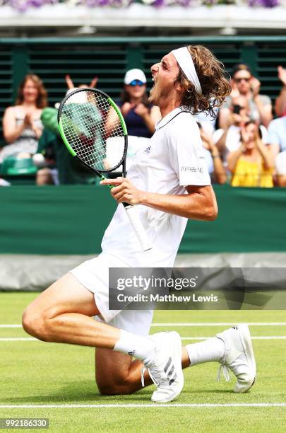 Stefanos Tsitsipas of Greece celebrates after defeating Jared Donaldson of the United States in their Men's Doubles first round match on day four of...