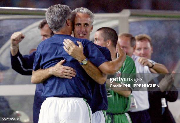 Irish coach Mick Mc Carthy hugs one of his staff member after winning the Group E first round match against Saudi Arabia counting for the 2002 FIFA...