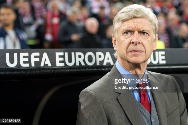 Arsenal's coach Arsene Wenger reacts during the Europa league group phase soccer match between 1. FC Cologne and FC Arsenal in Cologne, Germany, 23...