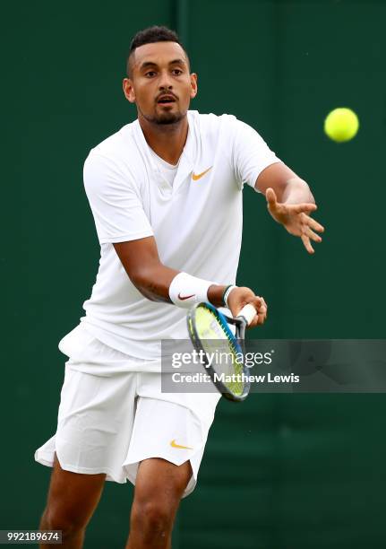 Nick Kyrgios of Australia returns a shot against Robin Haase of Netherlands during their Men's Singles second round match on day four of the...