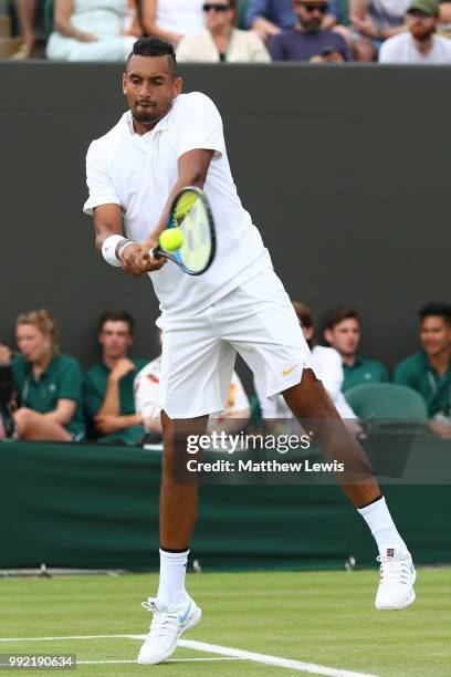 Nick Kyrgios of Australia returns a shot against Robin Haase of Netherlands during their Men's Singles second round match on day four of the...