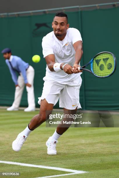 Nick Kyrgios of Australia returns a shot against Robin Haase of Netherlands during their Men's Singles second round match on day four of the...