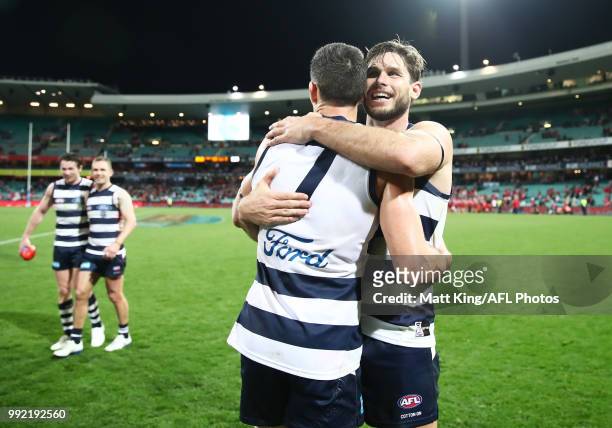 Harry Taylor and Tom Hawkins of the Cats celebrate victory after the round 16 AFL match between the Sydney Swans and the Geelong Cats at Sydney...