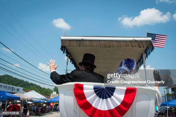 July 4: A man dressed as President Abraham Lincoln waves to the crowd during the Ripley 4th of July Grand Parade in Ripley, West Virginia Wednesday...