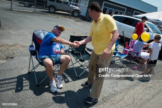 July 4: Rep. Alex Mooney, R-W.Va., greets the crowd gathered to watch the Ripley 4th of July Grand Parade in Ripley, West Virginia Wednesday July 4,...