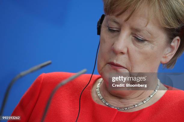 Angela Merkel, Germany's chancellor, pauses during a news conference at the Chancellery in Berlin, Germany, on Thursday July 2018. A former senior...