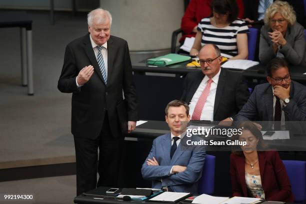 German Interior Minister and leader of the Bavarian Social Union , Horst Seehofer , attends debates at the last session of the Bundestag before the...