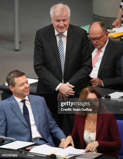 German Interior Minister and leader of the Bavarian Social Union , Horst Seehofer, attends debates at the last session of the Bundestag before the...