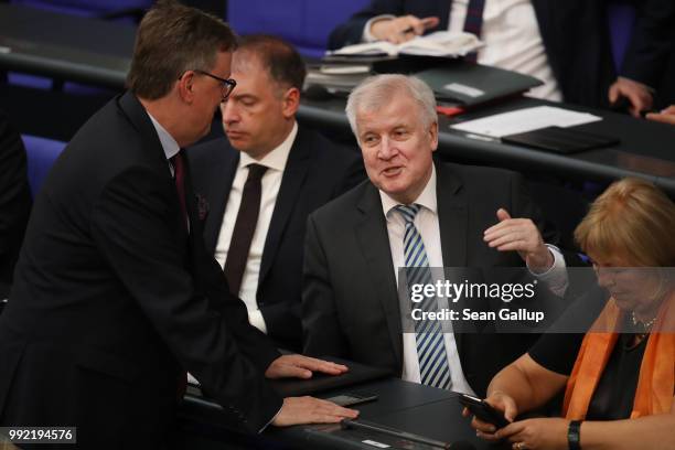 German Interior Minister and leader of the Bavarian Social Union , Horst Seehofer, attends debates at the last session of the Bundestag before the...