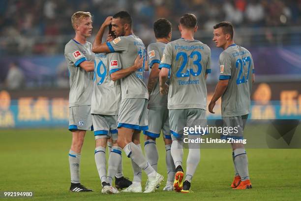 Ievgenii Konoplyanka celebrates a goal with teammate during the 2018 Clubs Super Cup match between Schalke and Southampton at Kunshan Sports Center...
