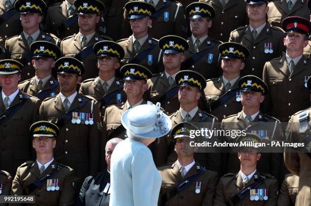 Queen Elizabeth II , Colonel-in-Chief Royal Scots Dragoon Guards arrives for a group photograph after she presented a new standard to the regiment at...