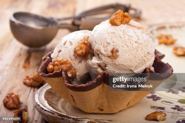 fresh nut ice cream in waffle cup - vanilleeis stock-fotos und bilder