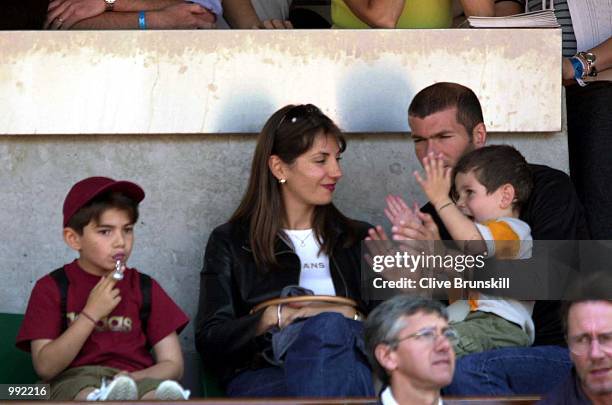Zinedine Zidane of France watches with his family on centre court during the French Open Tennis at Roland Garros, Paris, France....DIGITAL IMAGE....