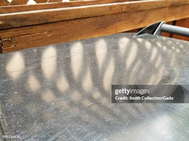 White ash from forest fires in Yolo County, California blanketed outdoor surfaces in the San Francisco Bay Area, July 2, 2018.