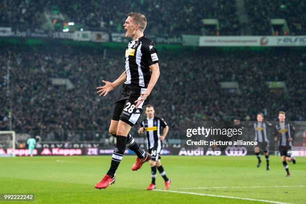 Gladbach's Matthias Ginter scores 2-0 during the German Bundesliga soccer match between Borussia Moenchengladbach and Bayern Munich at the Borussia...