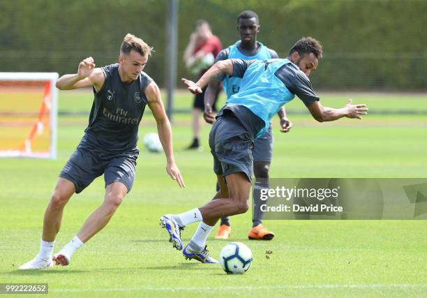 Pierre-Emerick Aubameyang and Rob Holding of Arsenal during pre-season training session at London Colney on July 5, 2018 in St Albans, England.