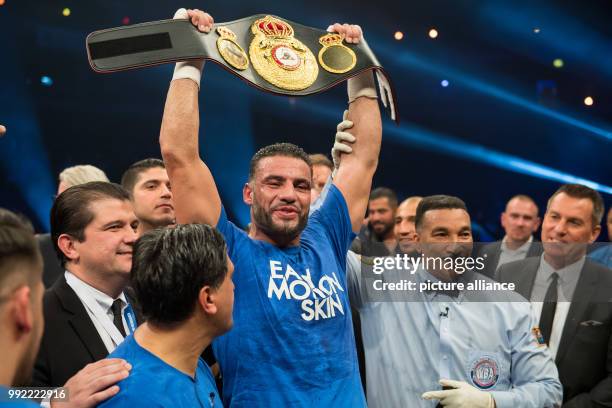 German Manuel Charr celebrates with the championship belt after the WBA World Championship Heavyweight in Oberhausen, Germany, 25 November 2017....