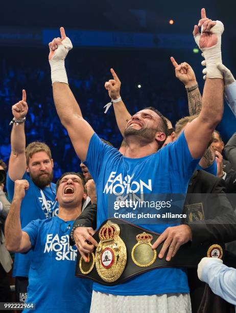 German Manuel Charr celebrates while the championship belt is being put on after the WBA World Championship Heavyweight in Oberhausen, Germany, 25...