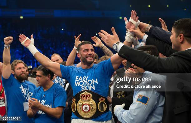 German Manuel Charr celebrates while the championship belt is being put on after the WBA World Championship Heavyweight in Oberhausen, Germany, 25...