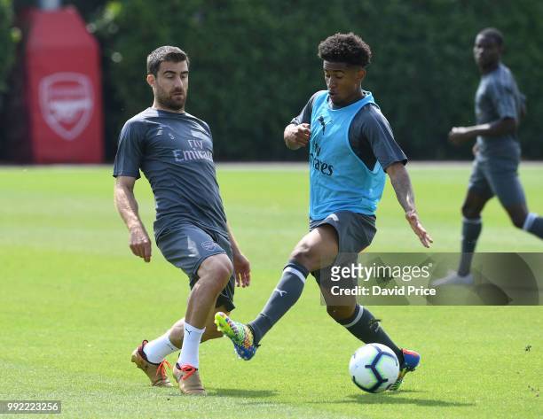 Sokratis Papastathopoulos and Reiss Nelson of Arsenal during pre-season training session at London Colney on July 5, 2018 in St Albans, England.