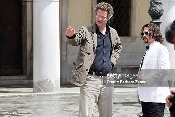 Actor Johnny Depp and the director Florian Henckel von Donnersmarck on location for "The tourist" at Piazza San Marco on May 13, 2010 in Venice,...