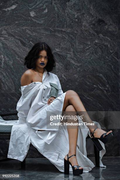 Delhi based model Renee Kujur poses in recreations of some of famous looks of R&B star Rihanna at the Metropolitan Hotel on July 2, 2018 in New...