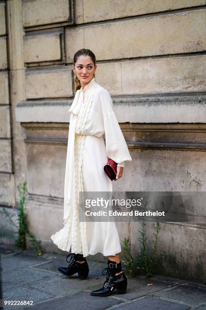Sofia Sanchez de Betal wear a white dress , outside Valentino, during Paris Fashion Week Haute Couture Fall Winter 2018/2019, on July 4, 2018 in...