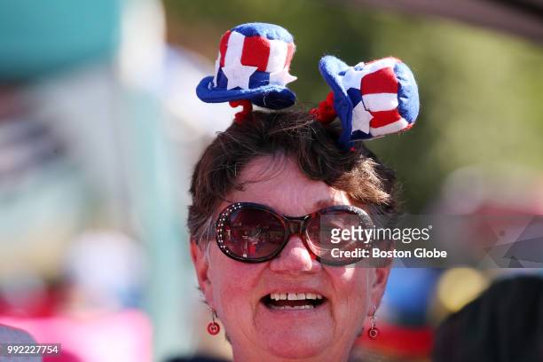Pamela Mansell of Ipswich waits for the Boston Pops Fireworks Spectacular at the Hatch Shell on the Esplanade in Boston, MA on July 04, 2018.