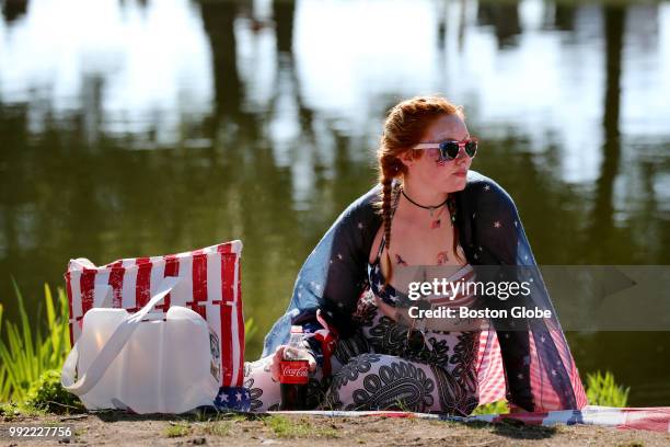 Danielle Frigerio, of Sidney Australia was dressed for the occasion while waiting for friends before the Boston Pops Fireworks Spectacular to begin...