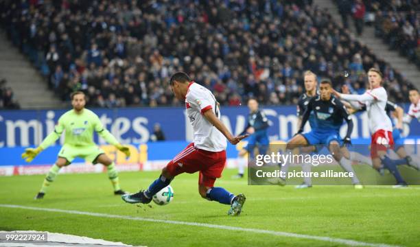 Hamburg's Douglas Santos shoots the ball within the goal area right before the own goal by Hoffenheim's Kevin Akpoguma during the German Bundesliga...