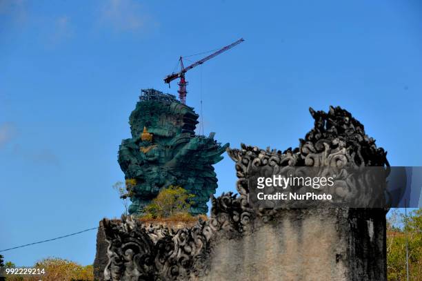 Tourists witnessed the completion of the construction project of Garuda Wisnu Kencana Statue in Bukit Unggasan, Jimbaran, Bali, July 03, 2018.the...