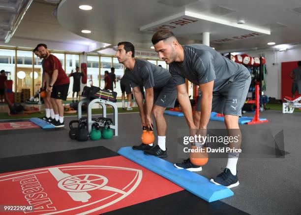 Henrikh Mkhitaryan and Sead Kolasinac of Arsenal during a pre-season training session at London Colney on July 5, 2018 in St Albans, England.