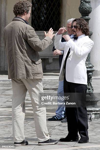 Actor Johnny Depp and the director Florian Henckel von Donnersmarck on location for "The tourist" at Piazza San Marco on May 13, 2010 in Venice,...