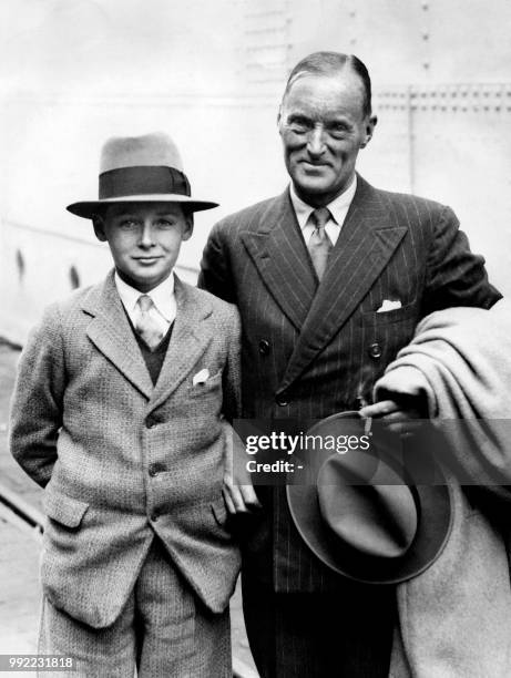 British racing driver Malcolm Campbell poses with his son Donald in Southampton on April 23, 1934.