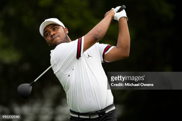 Harold Varner III tees off the 12th hole during round one of A Military Tribute At The Greenbrier at the Old White TPC course on July 5, 2018 in...