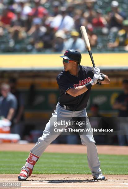 Michael Brantley of the Cleveland Indians bats against the Oakland Athletics in the first inning at Oakland Alameda Coliseum on June 30, 2018 in...