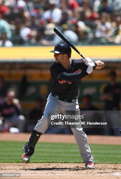 Lonnie Chisenhall of the Cleveland Indians bats against the Oakland Athletics in the second inning at Oakland Alameda Coliseum on June 30, 2018 in...