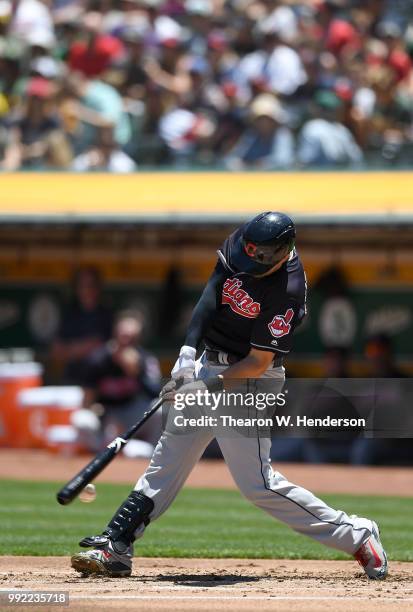 Lonnie Chisenhall of the Cleveland Indians bats against the Oakland Athletics in the second inning at Oakland Alameda Coliseum on June 30, 2018 in...