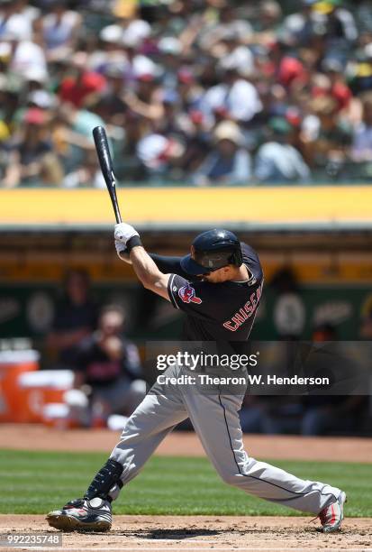 Lonnie Chisenhall of the Cleveland Indians bats against the Oakland Athletics in the second inning at Oakland Alameda Coliseum on June 30, 2018 in...