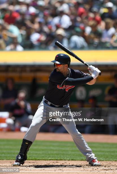 Lonnie Chisenhall of the Cleveland Indians bats against the Oakland Athletics in the second inning at Oakland Alameda Coliseum on June 30, 2018 in...