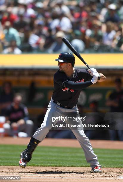 Lonnie Chisenhall of the Cleveland Indians bats against the Oakland Athletics in the second inning at Oakland Alameda Coliseum on June 30, 2018 in...