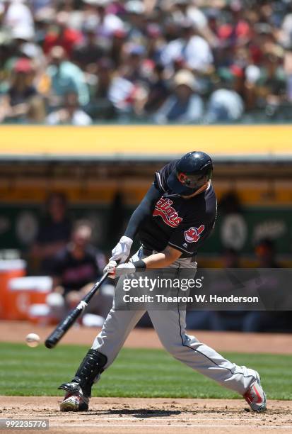 Lonnie Chisenhall of the Cleveland Indians bats against the Oakland Athletics in the second inning at Oakland Alameda Coliseum on June 30, 2018 in...