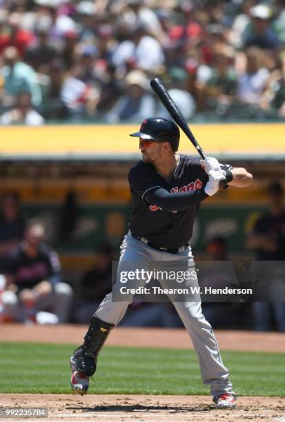 Lonnie Chisenhall of the Cleveland Indians bats against the Oakland Athletics in the second inning at Oakland Alameda Coliseum on June 30, 2018 in...