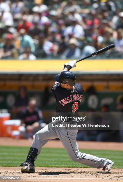 Lonnie Chisenhall of the Cleveland Indians bats against the Oakland Athletics in the second inning at Oakland Alameda Coliseum on June 30, 2018 in...