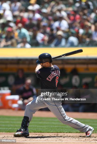 Lonnie Chisenhall of the Cleveland Indians bats against the Oakland Athletics in the second inning at Oakland Alameda Coliseum on June 30, 2018 in...